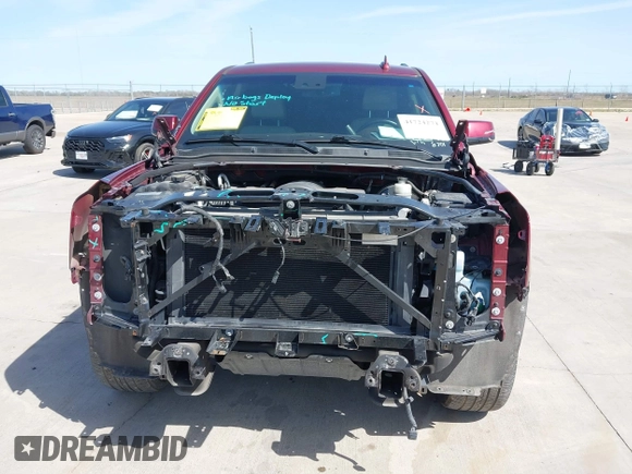 2020 GMC Yukon XL Denali with VIN 1GKS1HKJ3LR238701, listed as a IAAI auction lot 41724274 with 107,323 mi miles and . Bid and sale history available at DreamBid. Image 6.
