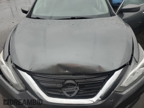 2017 Nissan Altima S z VIN 1N4AL3AP4HC243691, wystawiony jako Copart lot #56223285 z przebiegiem 101 332 mil mil oraz Szkoda całkowita • Salvage title. Historia ofert i sprzedaży dostępna na DreamBid. Obrazek 11.