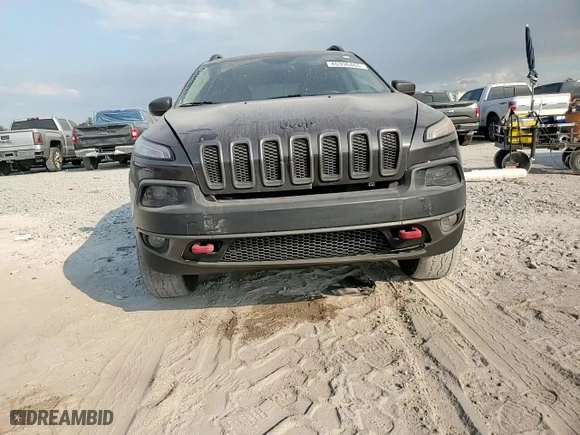 2015 Jeep Cherokee Trailhawk with VIN 1C4PJMBSXFW780368, listed as a Copart auction lot 45396465 with 113,870 mi miles and Salvage Title. Bid and sale history available at carsss.com. Image 11.