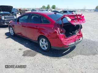 2014 Ford Focus SE with VIN 1FADP3F22EL171416, listed as a IAAI auction lot 41982150 with 130,782 mi miles. Bid and sale history available at carsss.com. Image 3.