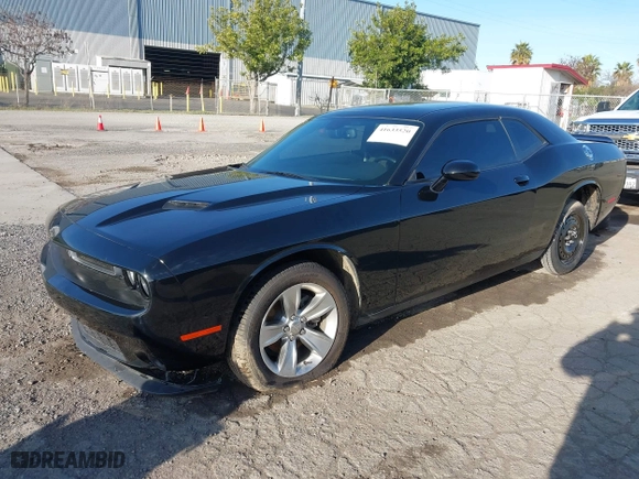 2021 Dodge Challenger SXT with VIN 2C3CDZAG9MH630736, listed as a IAAI auction lot 41633520 with 62,895 mi miles. Bid and sale history available at carsss.com. Image 2.