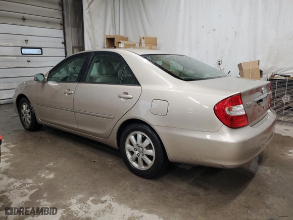 2004 Toyota Camry LE with VIN 4T1BF30K54U573108, listed as a Copart auction lot 84451194 with 173,466 mi miles and Salvage Title. Bid and sale history available at carsss.com. Image 2.