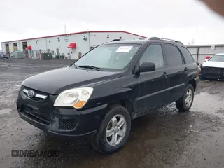 2009 Kia Sportage LX with VIN KNDJE723497612745, listed as a IAAI auction lot 41974301 with 141,110 mi miles and . Bid and sale history available at carsss.com. Image 17.