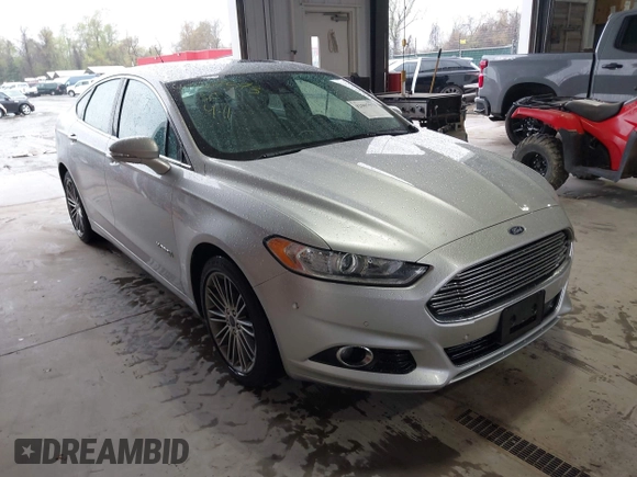 2013 Ford Fusion SE Hybrid with VIN 3FA6P0LU2DR319335, listed as a IAAI auction lot 42007573 with 135,099 mi miles. Bid and sale history available at carsss.com. Image 1.