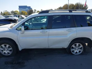 2011 Mitsubishi Endeavor LS with VIN 4A4JN2AS7BE028071, listed as a IAAI auction lot 41391634 with 149,070 mi miles. Bid and sale history available at carsss.com. Image 14.