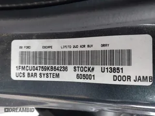 2009 Ford Escape Limited with VIN 1FMCU04759KB64236, listed as a IAAI auction lot 41796461 with 214,949 mi miles. Bid and sale history available at carsss.com. Image 9.
