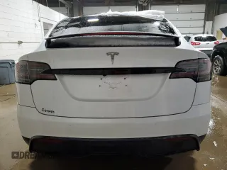 2023 Tesla Model X with VIN 7SAXCDE5XPF381338, listed as a Copart auction lot 51638855 with 1,570 mi miles and Clean Title. Bid and sale history available at carsss.com. Image 6.