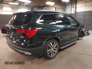 2016 Honda Pilot Touring with VIN 5FNYF6H98GB035226, listed as a IAAI auction lot 42022957 with 103,842 mi miles and . Bid and sale history available at DreamBid. Image 4.