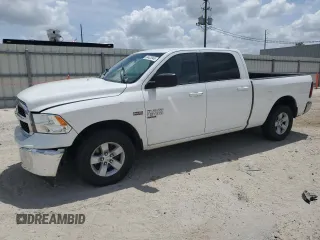 2021 Ram 1500 SLT with VIN 1C6RR7TT0MS516355, listed as a Copart auction lot 54423945 with 140,492 mi miles and Salvage title. Bid and sale history available at DreamBid. Image 1.
