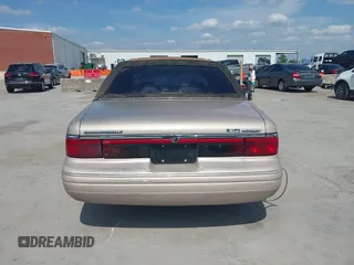 1997 Mercury Grand Marquis LS with VIN 2MELM75W3VX707138, listed as a IAAI auction lot 40055743 with 198,489 mi miles and . Bid and sale history available at DreamBid. Image 17.
