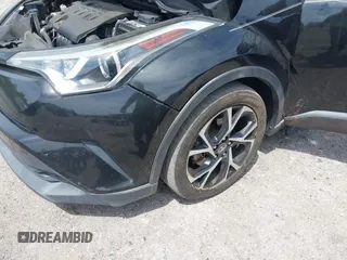 2018 Toyota C-HR XLE with VIN NMTKHMBX0JR008423, listed as a IAAI auction lot 42091445 with 124,811 mi miles. Bid and sale history available at carsss.com. Image 6.