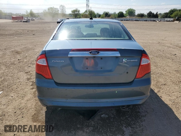 2012 Ford Fusion Hybrid z VIN 3FADP0L33CR288819, wystawiony jako Copart lot #56697025 z przebiegiem 65 486 mil mil oraz Szkoda całkowita • Salvage title. Historia ofert i sprzedaży dostępna na DreamBid. Obrazek 6.