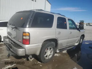 2005 GMC Yukon Denali z VIN 1GKEK63U35J228887, wystawiony jako Copart lot #68141304 z przebiegiem 238 024 mil mil oraz Szkoda całkowita • Salvage title. Historia ofert i sprzedaży dostępna na DreamBid. Obrazek 3.