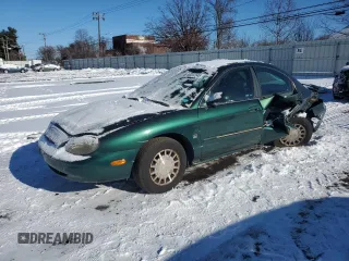 1999 Mercury Sable LS z VIN 1MEFM53S7XA603362, wystawiony jako Copart lot #88292545 z przebiegiem 93 776 mil mil oraz Nie do naprawy. Historia ofert i sprzedaży dostępna na DreamBid. Obrazek 1.