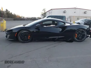 2023 McLaren Artura z VIN SBM16AEA4PW001449, wystawiony jako IAAI lot #41347791 z przebiegiem 4703 mil mil oraz . Historia ofert i sprzedaży dostępna na DreamBid. Obrazek 14.