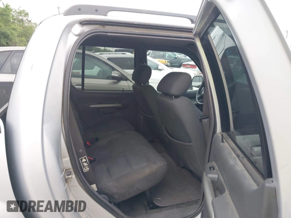 2002 Ford Explorer Sport Trac Value z VIN 1FMZU67EX2UB18161, wystawiony jako IAAI lot #42290334 z przebiegiem 192 498 mil mil oraz . Historia ofert i sprzedaży dostępna na DreamBid. Obrazek 8.