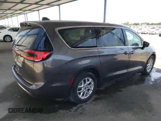 2023 Chrysler Pacifica Touring L with VIN 2C4RC1BG1PR581376, listed as a Copart auction lot 59901915 with 57,411 mi miles and Salvage title. Bid and sale history available at DreamBid. Image 3.