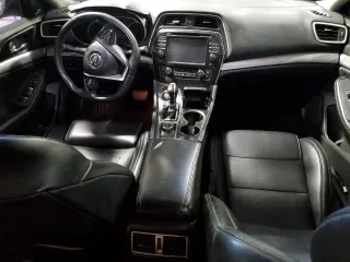 2017 Nissan Maxima SV with VIN 1N4AA6AP0HC383003, listed as a Copart auction lot 58060855 with 123,990 mi miles and Salvage title. Bid and sale history available at DreamBid. Image 8.
