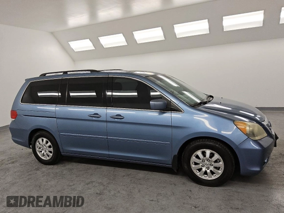 2009 Honda Odyssey EX-L with VIN 5FNRL38699B037510, listed as a Copart auction lot 49621365 with 101,995 mi miles and Clean Title. Bid and sale history available at DreamBid. Image 4.