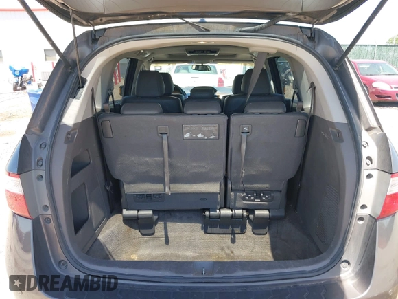 2012 Honda Odyssey Touring with VIN 5FNRL5H93CB109394, listed as a IAAI auction lot 42280018 with 190,412 mi miles and . Bid and sale history available at DreamBid. Image 16.