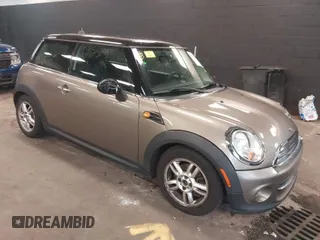 2013 MINI Cooper Hardtop with VIN WMWSU3C55DT679450, listed as a IAAI auction lot 41891583 with 106,410 mi miles. Bid and sale history available at carsss.com. Image 1.