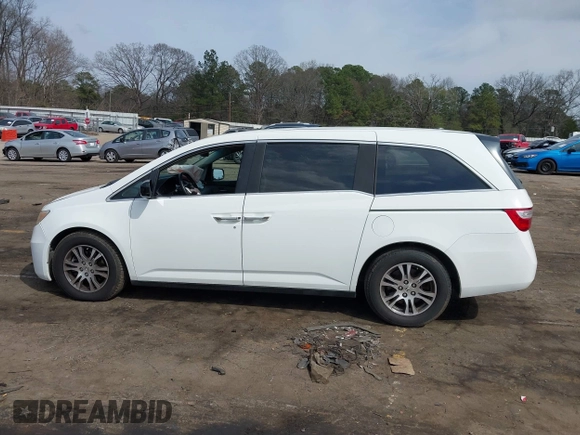 2011 Honda Odyssey EX-L with VIN 5FNRL5H67BB070541, listed as a IAAI auction lot 41812554 with 150,898 mi miles and . Bid and sale history available at DreamBid. Image 14.