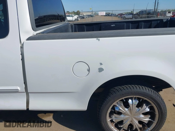2000 Ford F-150 XL with VIN 1FTRX17LXYKA19714, listed as a IAAI auction lot 41996370 with 0 mi miles. Bid and sale history available at carsss.com. Image 13.