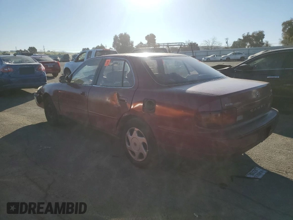 1995 Toyota Camry LE with VIN JT2GK12E5S0096419, listed as a Copart auction lot 41929695 with 153,131 mi miles and Salvage Title. Bid and sale history available at carsss.com. Image 2.