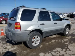 2005 Ford Escape XLT with VIN 1FMYU03155DA05427, listed as a Copart auction lot 50506675 with 142,130 mi miles and Salvage Title. Bid and sale history available at carsss.com. Image 3.