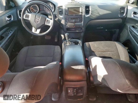 2013 Dodge Durango SXT z VIN 1C4RDHAGXDC697865, wystawiony jako Copart lot #52635305 z przebiegiem 206 980 mil mil oraz Czysty tytuł • Clean title. Historia ofert i sprzedaży dostępna na DreamBid. Obrazek 8.
