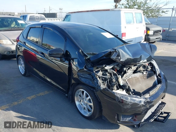 2015 Honda Fit LX z VIN 3HGGK5H57FM717203, wystawiony jako IAAI lot #41615075 z przebiegiem 99 933 mil mil oraz . Historia ofert i sprzedaży dostępna na DreamBid. Obrazek 1.