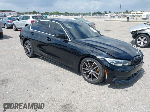 2021 BMW 3 Series 330i with VIN 3MW5R1J09M8B93600, listed as a IAAI auction lot 41735270 with 77,648 mi miles. Bid and sale history available at carsss.com. Image 1.