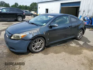 2007 Scion tC Spec z VIN JTKDE167270216674, wystawiony jako Copart lot #59153285 z przebiegiem Nie podano mil oraz Szkoda całkowita • Salvage title. Historia ofert i sprzedaży dostępna na DreamBid. Obrazek 1.