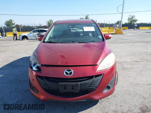 2014 Mazda 5 Sport with VIN JM1CW2BL9E0168662, listed as a IAAI auction lot 42726429 with 145,190 mi miles and . Bid and sale history available at DreamBid. Image 12.