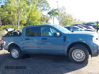 2023 Ford Maverick XL with VIN 3FTTW8E32PRA56304, listed as a IAAI auction lot 41147511 with 27,787 mi miles and . Bid and sale history available at DreamBid. Image 14.