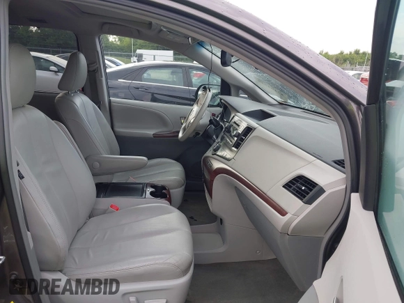 2014 Toyota Sienna XLE with VIN 5TDYK3DC0ES496716, listed as a IAAI auction lot 42494549 with 158,645 mi miles and . Bid and sale history available at DreamBid. Image 5.