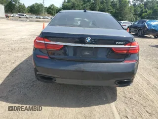2016 BMW 7 Series 750i z VIN WBA7F0C57GGM20650, wystawiony jako Copart lot #57177555 z przebiegiem 113 632 mil mil oraz Tytuł czysty. Historia ofert i sprzedaży dostępna na DreamBid. Obrazek 6.