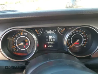2021 Jeep Wrangler Sport with VIN 1C4GJXAG2MW767559, listed as a Copart auction lot 82108354 with 32,728 mi miles and Salvage Title. Bid and sale history available at DreamBid. Image 9.