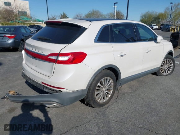 2016 Lincoln MKX Select with VIN 2LMTJ6KR5GBL30010, listed as a IAAI auction lot 41741385 with 112,647 mi miles. Bid and sale history available at carsss.com. Image 4.
