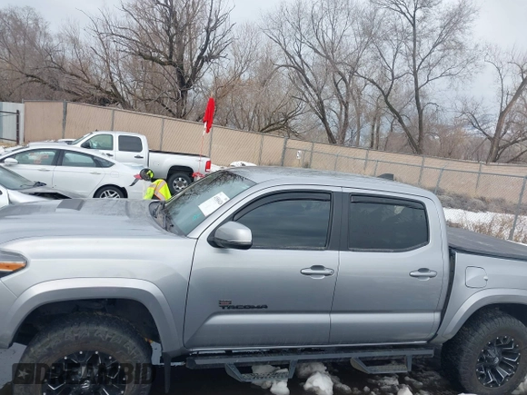 2021 Toyota Tacoma SR z VIN 3TMCZ5AN0MM386867, wystawiony jako IAAI lot #41580426 z przebiegiem 46 559 mil mil oraz . Historia ofert i sprzedaży dostępna na DreamBid. Obrazek 14.