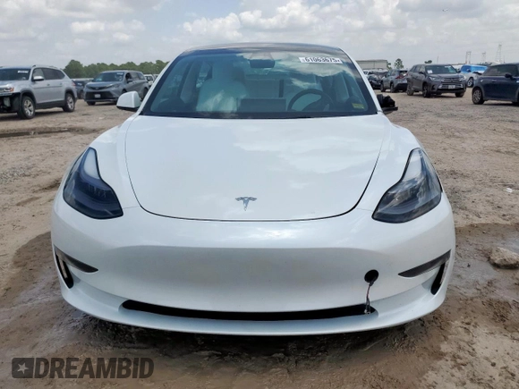 2023 Tesla Model 3 z VIN 5YJ3E1EAXPF600008, wystawiony jako Copart lot #61063675 z przebiegiem 58 733 mil mil oraz Szkoda całkowita • Salvage title. Historia ofert i sprzedaży dostępna na DreamBid. Obrazek 5.