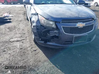 2014 Chevrolet Cruze 1LT with VIN 1G1PC5SB9E7323441, listed as a IAAI auction lot 41400152 with 134,594 mi miles and . Bid and sale history available at DreamBid. Image 6.