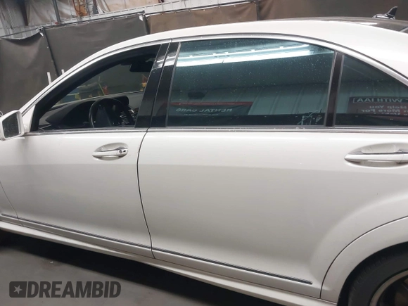 2011 Mercedes-Benz S 63 AMG with VIN WDDNG7EB7BA402556, listed as a IAAI auction lot 42097570 with 77,145 mi miles and . Bid and sale history available at DreamBid. Image 14.