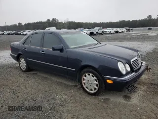1997 Mercedes-Benz E-Class with VIN WDBJF55FXVJ027722, listed as a Copart auction lot 44835585 with 0 mi miles and Salvage Title. Bid and sale history available at carsss.com. Image 4.