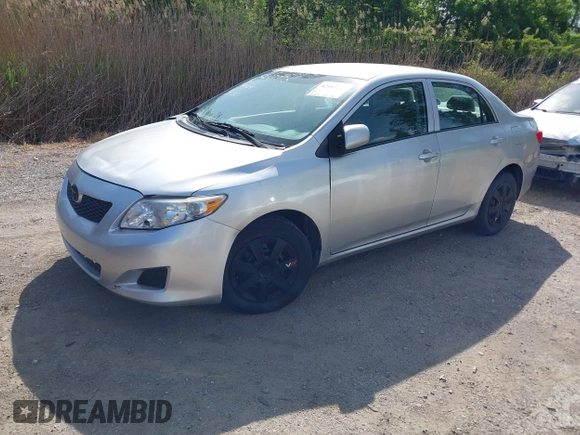 2010 Toyota Corolla with VIN 1NXBU4EE6AZ243293, listed as a IAAI auction lot 42167775 with 221,328 mi miles. Bid and sale history available at carsss.com. Image 2.