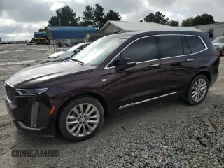 2020 Cadillac XT6 FWD Premium Luxury с VIN 1GYKPCRS9LZ146479, выставлен на аукционе Copart как лот 60662655 с пробегом 88 556 миль миль и Списание • Salvage title. История ставок и продаж доступна на DreamBid. Изображение 1.