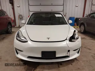 2018 Tesla Model 3 Long Range Battery with VIN 5YJ3E1EB5JF084446, listed as a IAAI auction lot 41209852 with 70,125 mi miles and . Bid and sale history available at DreamBid. Image 13.