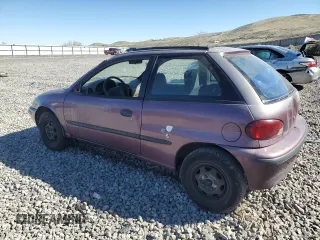 1996 Geo Metro z VIN 2C1MR2296T6778911, wystawiony jako Copart lot #50937725 z przebiegiem 157 821 mil mil oraz Szkoda całkowita • Salvage title. Historia ofert i sprzedaży dostępna na DreamBid. Obrazek 2.