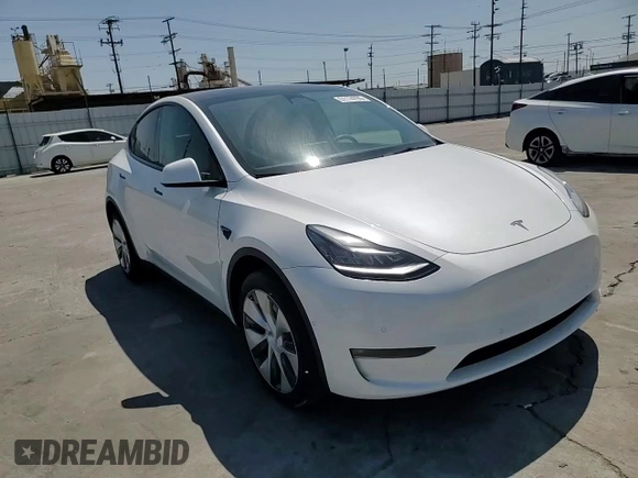 2022 Tesla Model Y Long Range z VIN 7SAYGDEE2NF513823, wystawiony jako Copart lot #51174795 z przebiegiem 28 143 mil mil oraz Szkody całkowita. Historia ofert i sprzedaży dostępna na DreamBid. Obrazek 11.