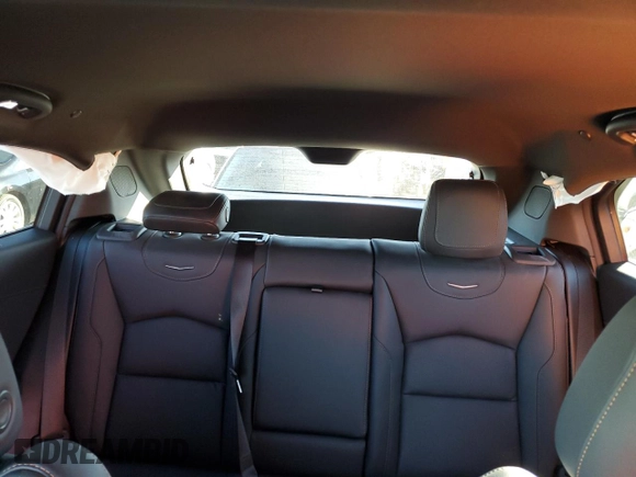 2022 Cadillac XT4 AWD Sport с VIN 1GYFZFR49NF130155, выставлен на аукционе Copart как лот 80286034 с пробегом 28 447 миль миль и Списание • Salvage title. История ставок и продаж доступна на DreamBid. Изображение 10.